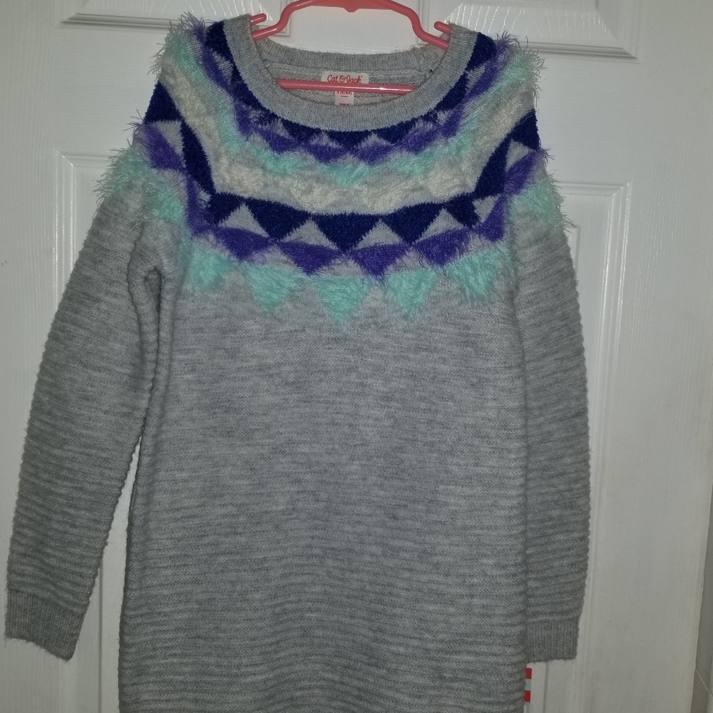 Grade school girl sweater dress.